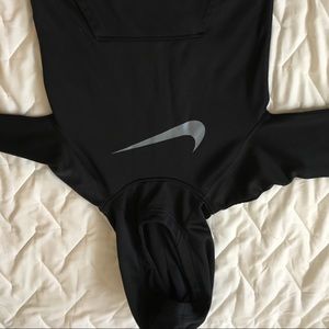 This is a dri-fit black and gray nike sweatshirt.
